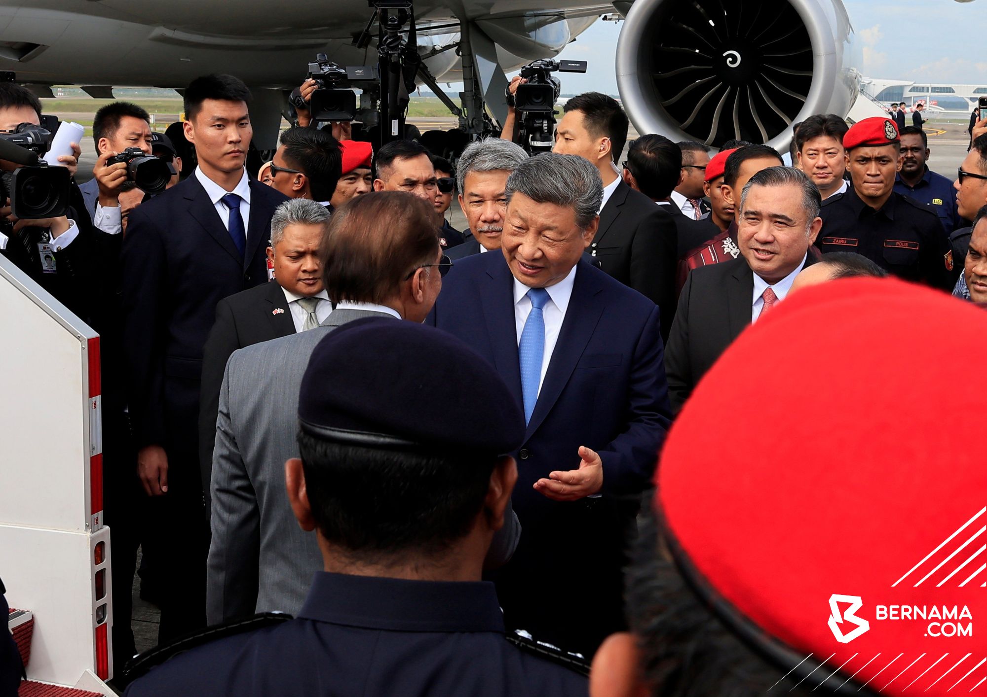 Xi