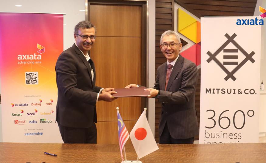 Vivek Sood dan Pegawai Urusan, Ketua Pegawai Operasi, Unit Perniagaan IT & Komunikasi Mitsui, Isao Kohiyama di majlis menandatangani kerjasama tersebut.