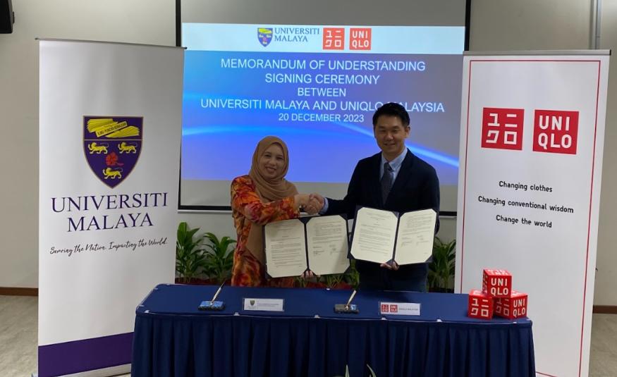 (Dari kiri) Profesor Dr. Yusniza Kamarulzaman dan Yuki Yamada menandatangani MoU secara rasmi hari ini.